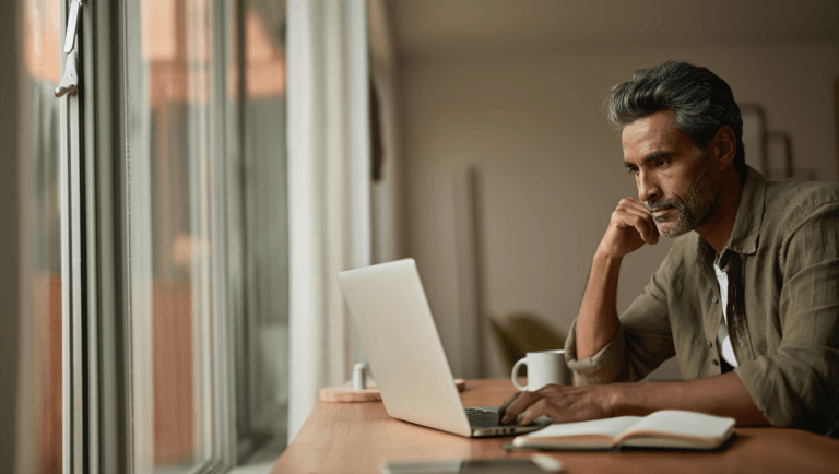 A man trying to determine what to Do When Laid Off at 50